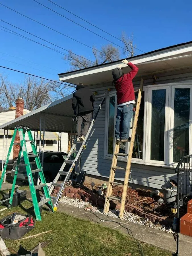 Restoration crew performing exterior repair in Syracuse
